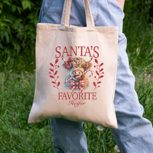 Santa’s Favorite Heifer Tote – Christmas Highland Cow Bag – 100% Cotton 16x15