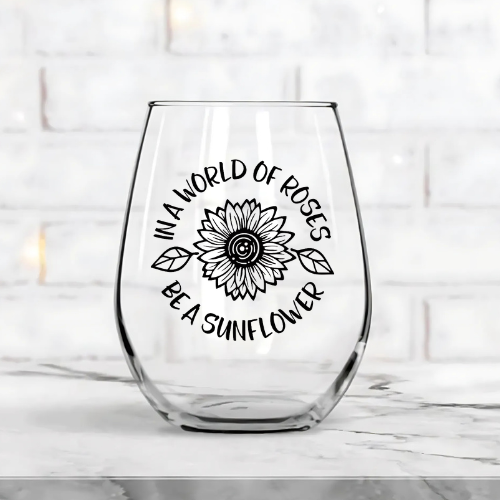 In A World Of Roses Be A Sunflower Wine Glass